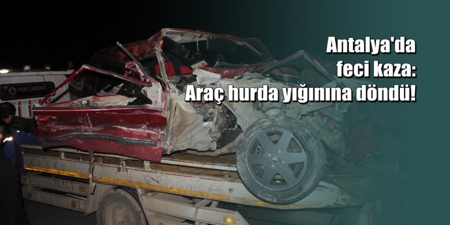 Otomobil yandan çarptığı kamyonun altından güçlükle çıkarıldı